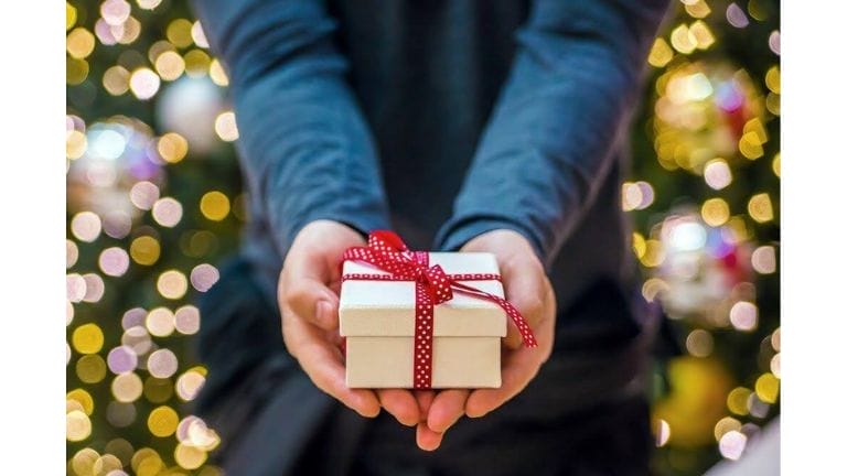 Person holding present